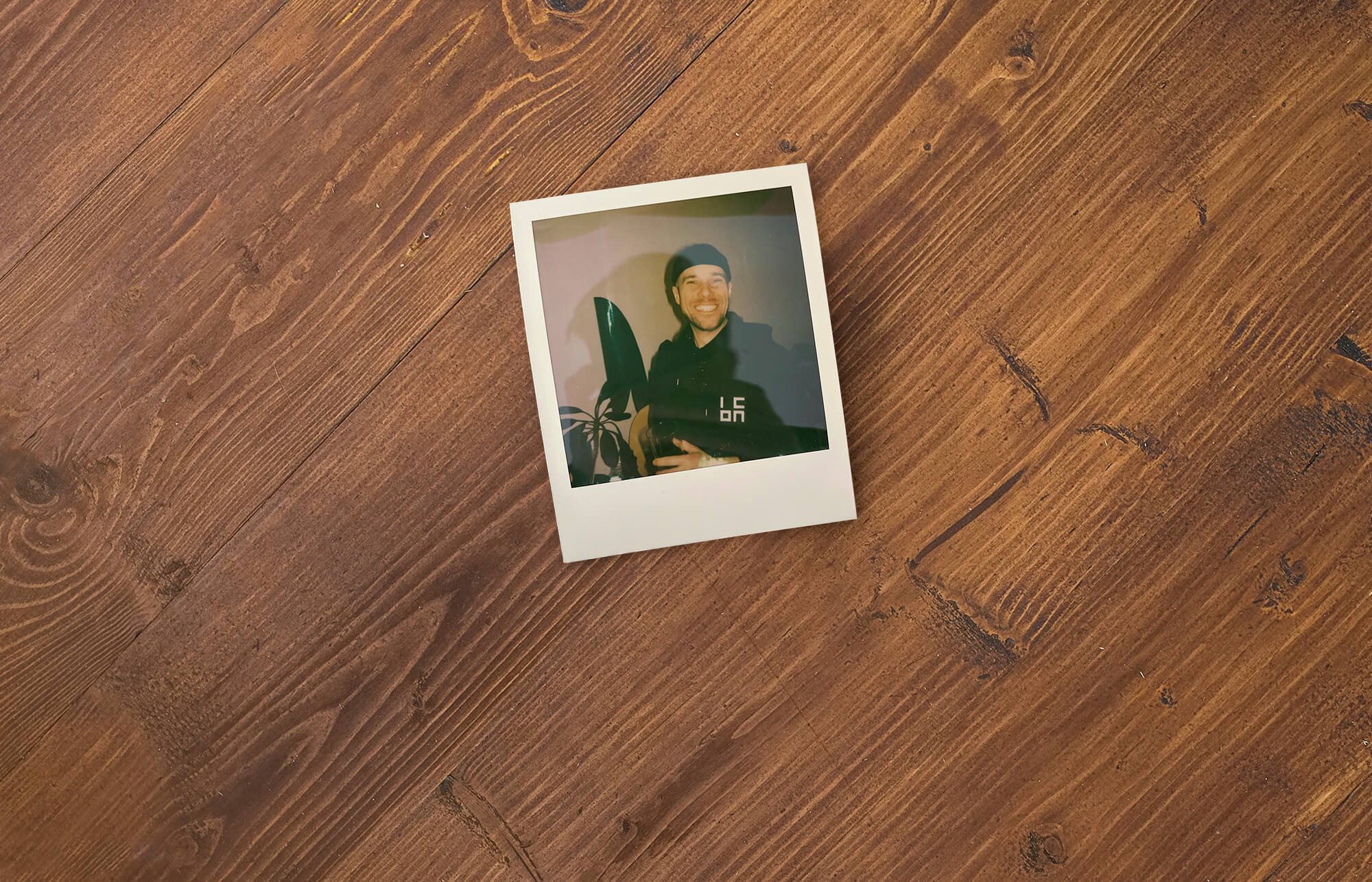 A polaroid picture of me wearing a icon incar hoody
